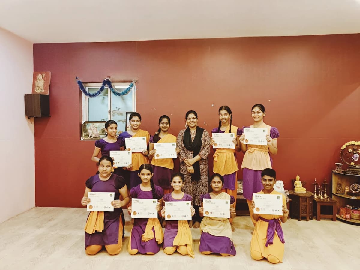 Students learning Adavus